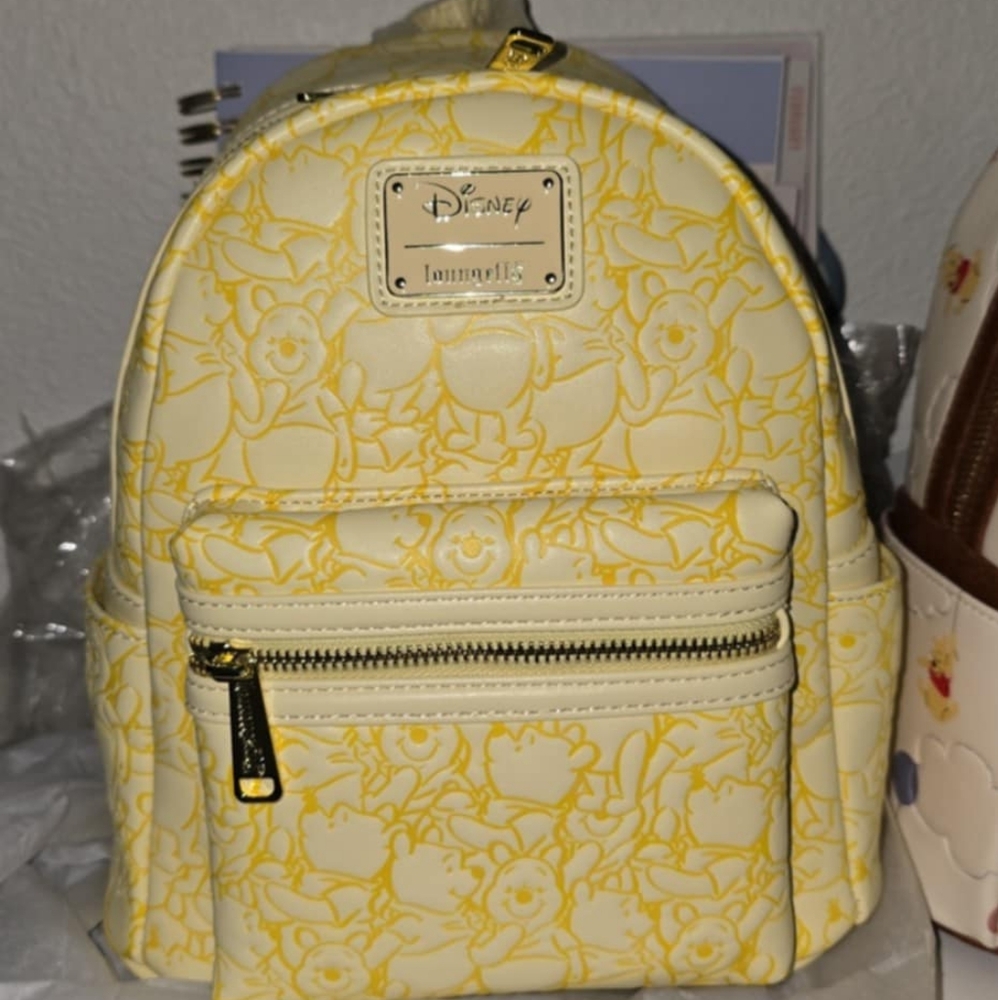AOP yellow pooh Loungefly